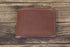brown leather bifold wallet